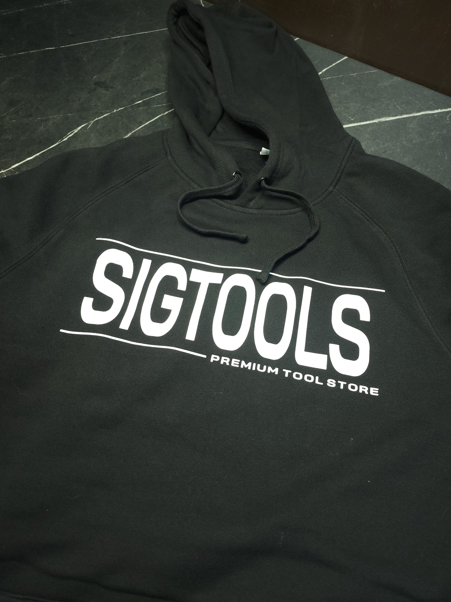 Sudadera con capucha con la firma de Sigtools