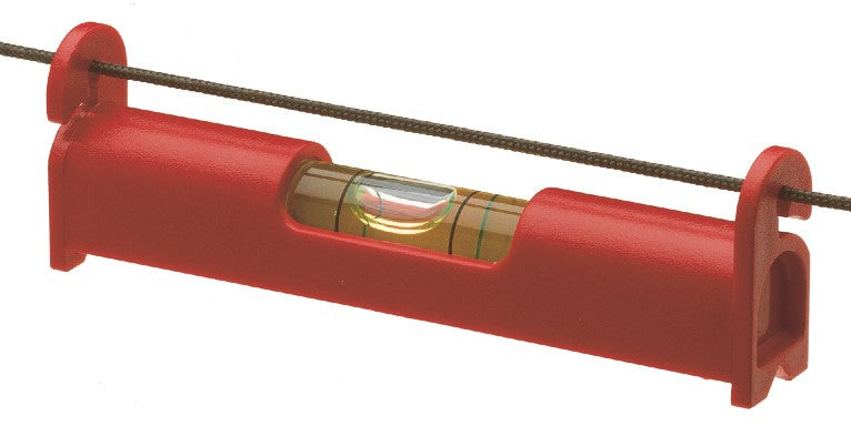 Small spirit level hanging on tensioned string for accurate incline measurement.