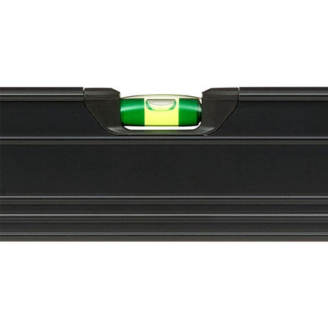 Close-up of the horizontal vial on the Hultafors PV Spirit Level, showing the +30% magnification lens and luminescent reflector.