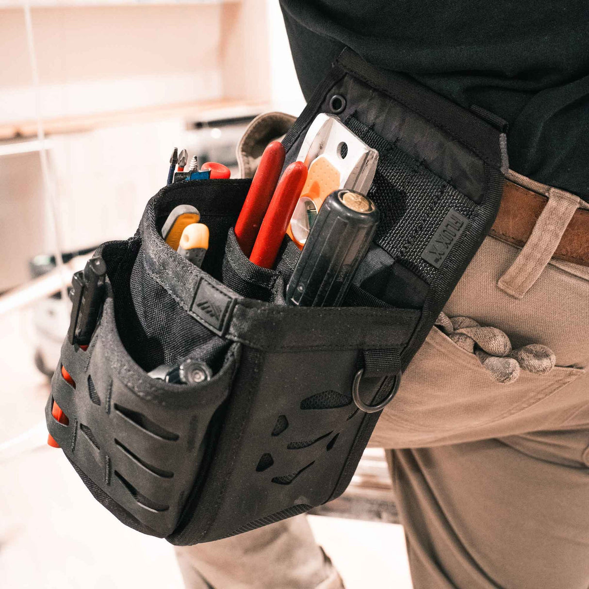 Flux X Pouch with double clips and HypaLock Grid system for added customization.