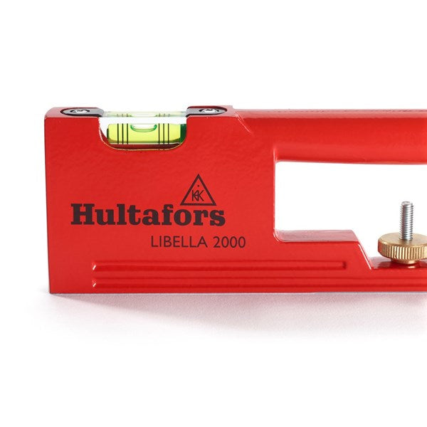 A close-up of the magnifying lens and luminescent reflector on a vial of the Hultafors Libella 2000.