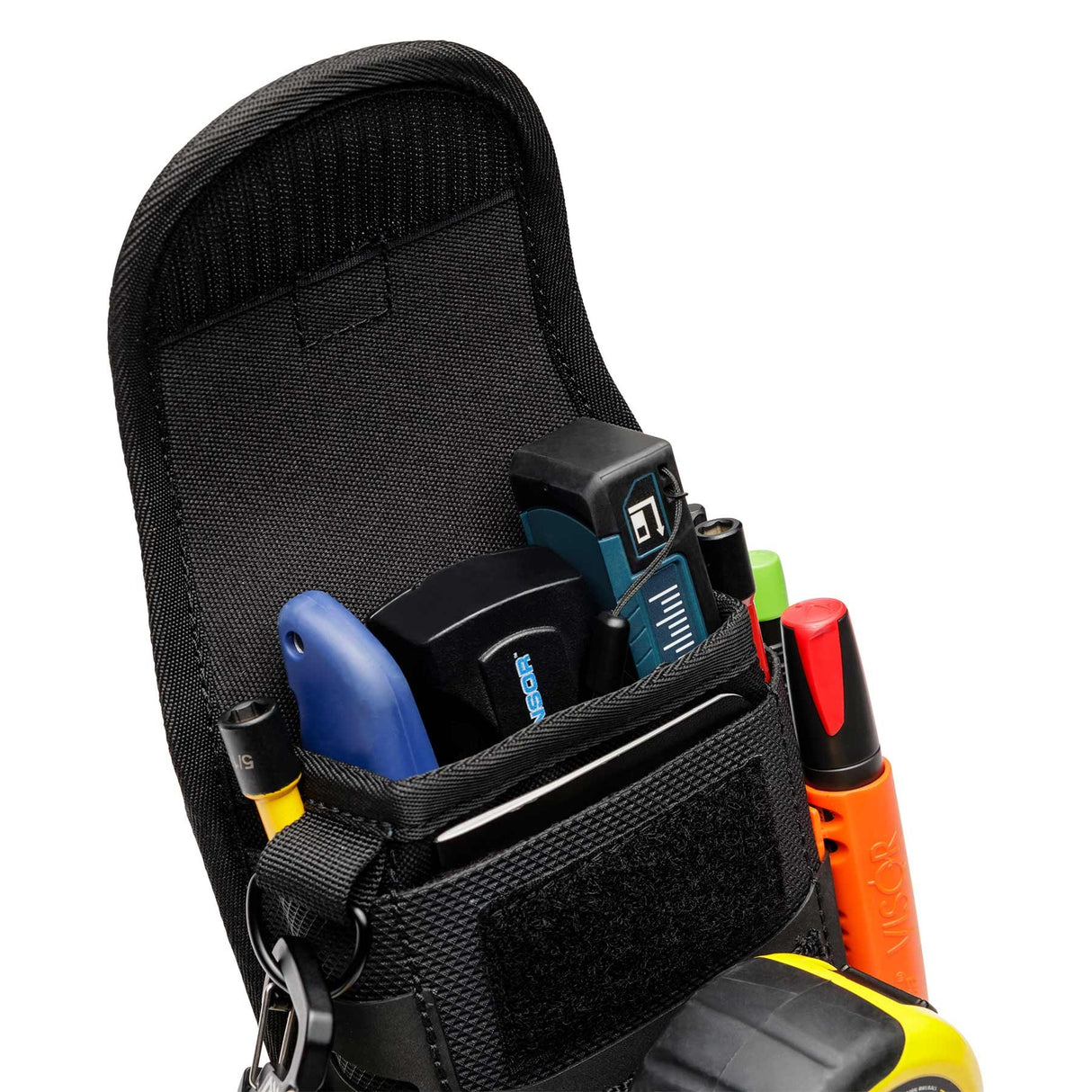 The Diamondback EDC X pouch fully loaded with a laser measure, notepad, and pencils to show its 'Everyday Carry' capacity.