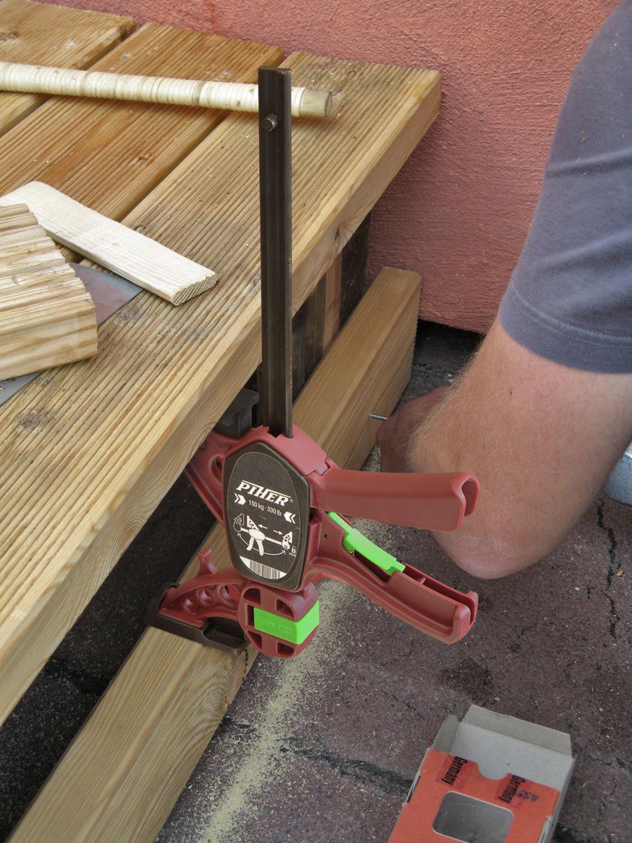 Reversible Piher Quick Clamp, easily converted to a spreader with a single click, showing nylon fiberglass heads.