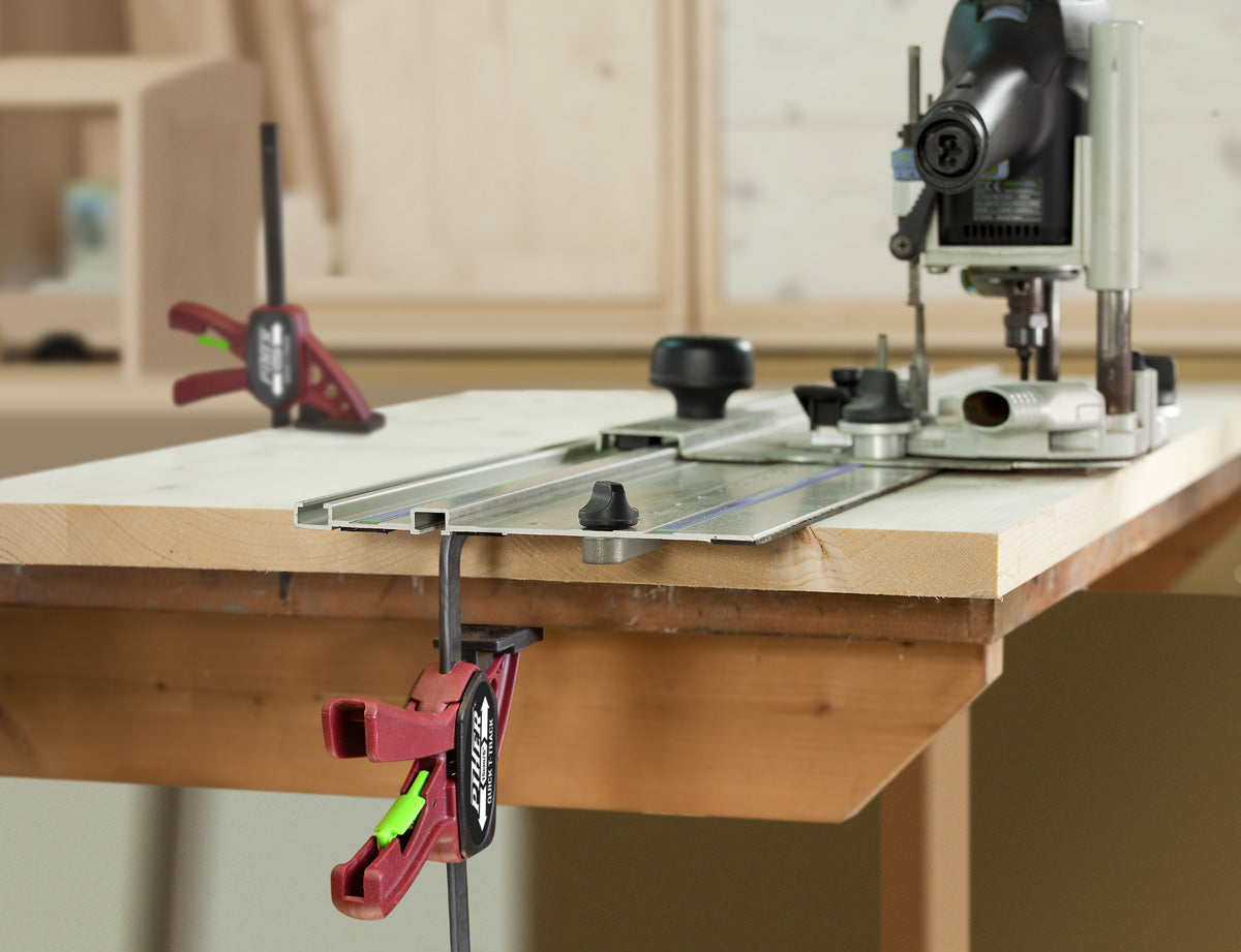A set of Piher Mini Quick T-Track Clamps, an essential accessory for track saw users in New Zealand.