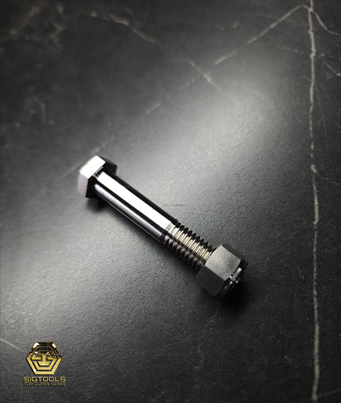 Close-up side view photo of a Martinez Hex (6-Point) Titanium Replacement Bolt for M4 Ti-Heads with the nut installed.