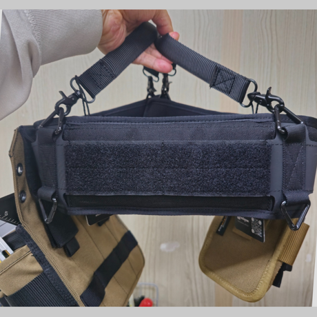 A DURAWORK tool belt with two Dura 505 handles attached, showing a balanced, 'briefcase-style' carry