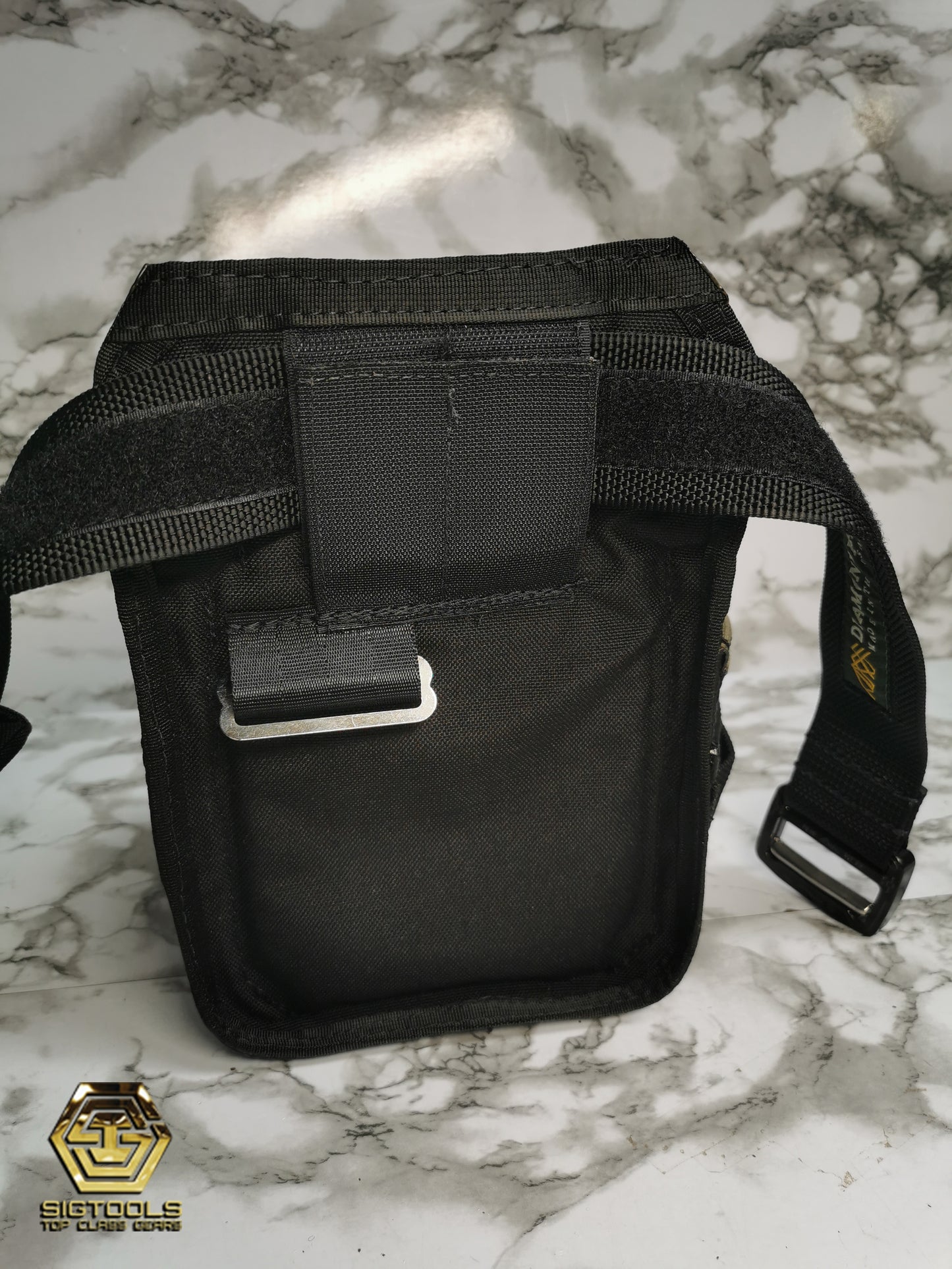 A rear view of the Diamondback Cobra fashion belt with an attached sack, demonstrating the added storage and utility of the accessory.