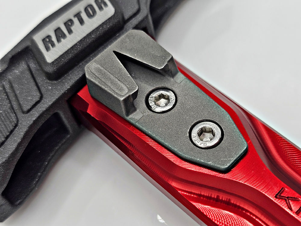 A Kinetic Customs Raptor Replaceable Side Nail Puller being installed onto an aluminium Raptor shaft.
