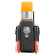 The external webbing loops on the Badger Spray Can Holster, shown holding a pencil and a small tool.