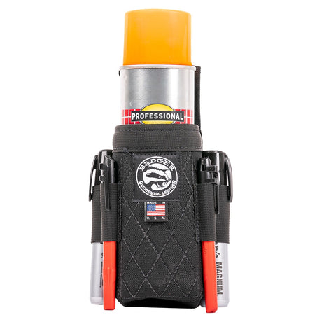 The external webbing loops on the Badger Spray Can Holster, shown holding a pencil and a small tool.