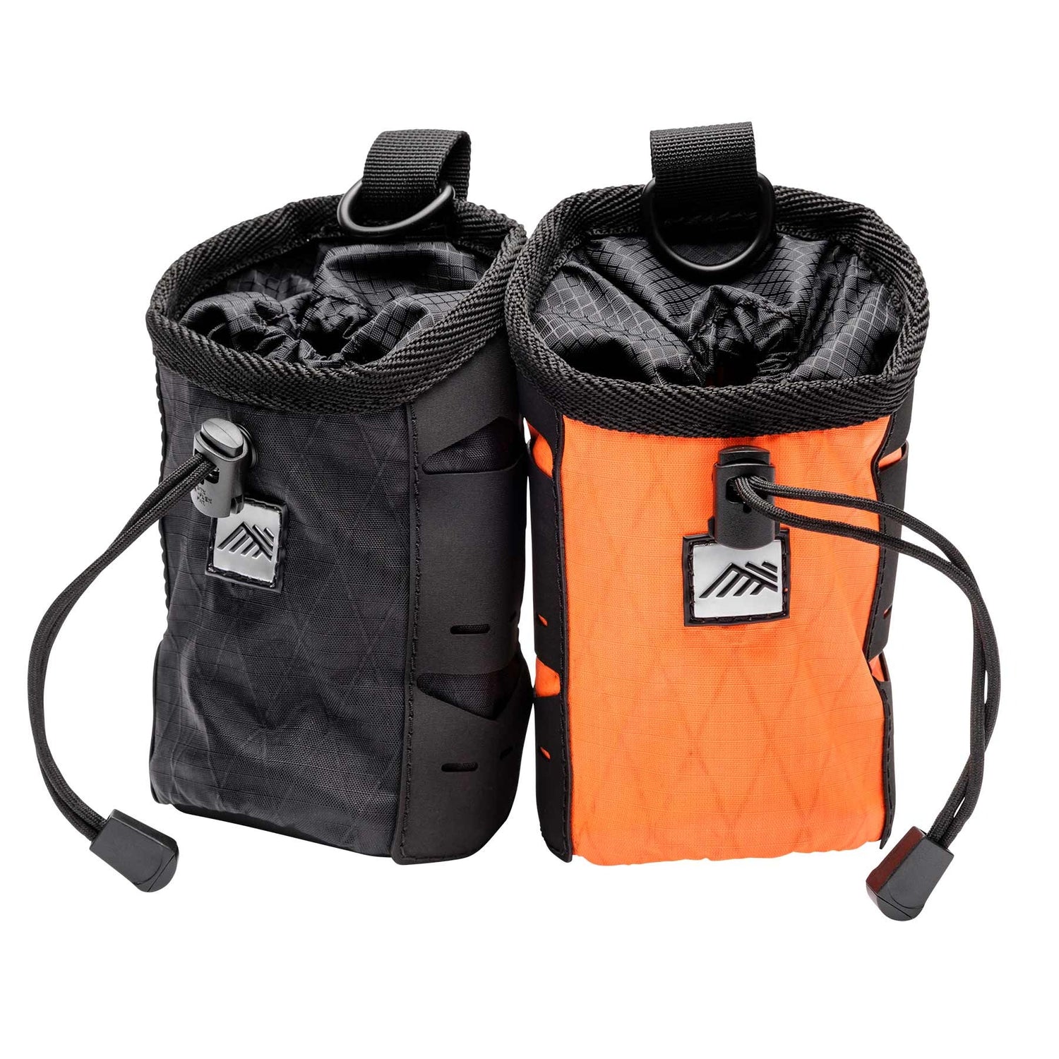 The Diamondback Mini Sax X DBX, a compact and durable pouch shown in both Black and Hi-Vis Orange.